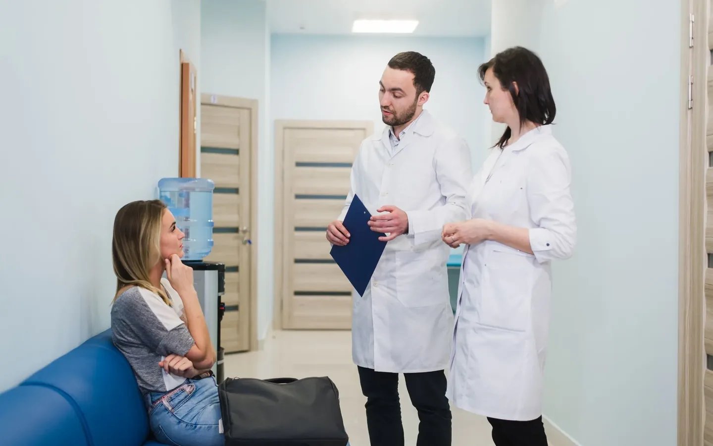 A patient being reassured by doctors