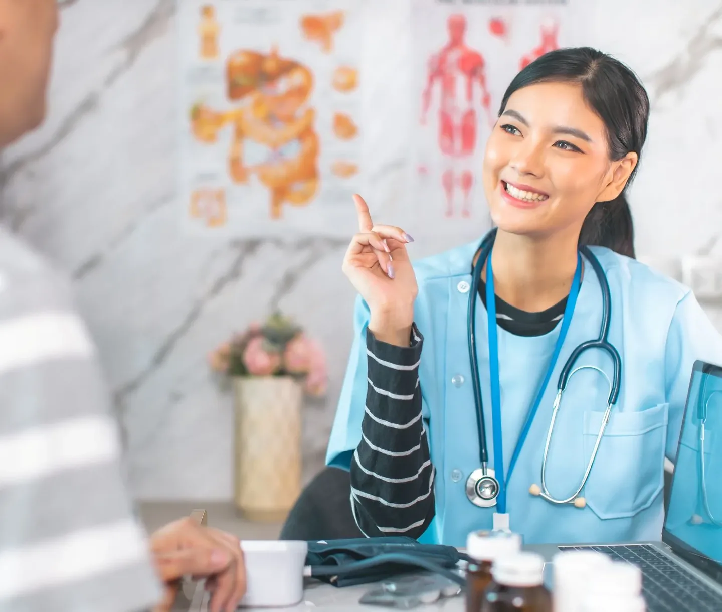 A doctor checking a patient at the clinic