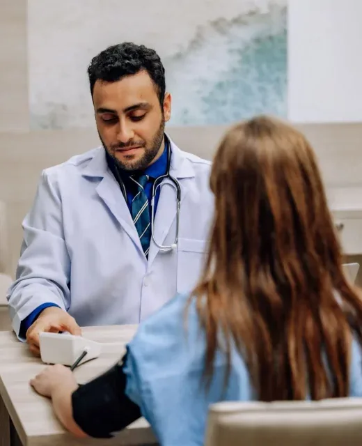 A doctor explaining a diagnosis to a patient